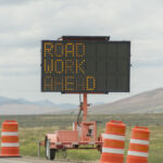 road work ahead traffic sign on highway between utah and nevada USA America